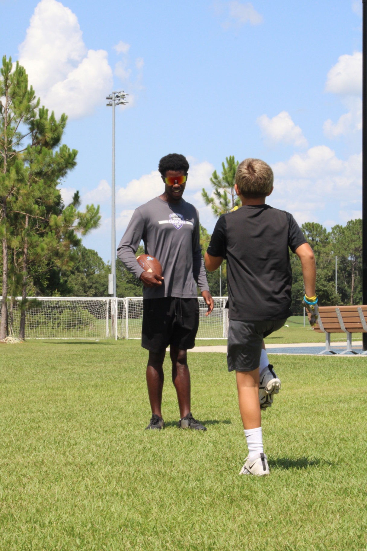Coach & Player — Off The Chain Performance youth flag football, Orlando, Central Florida